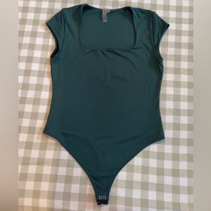 Gorgeous emerald green body suit